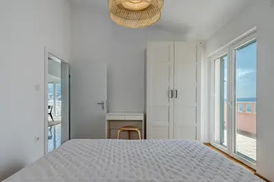 Krevet ili kreveti u jedinici u objektu Beachfront apartments