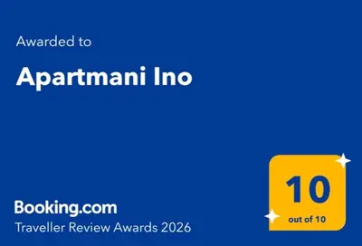 Certifikat, nagrada, logo ili neki drugi dokument izložen u objektu Apartmani Ino