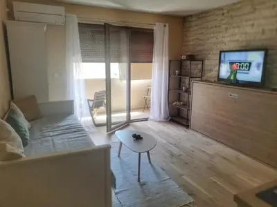 TV i/ili zabavni centar u objektu Apartman Matan, Postira