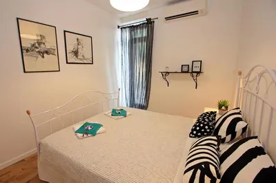Krevet ili kreveti u jedinici u objektu Apartman Michelangelo in the centar of Supetar