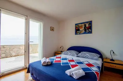 Krevet ili kreveti u jedinici u objektu Beach House Splitska