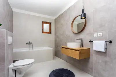 Kupaonica u objektu VILLA REMUSIC Pool, whirlpool, Sauna,4 bedrooms, amazing landscape