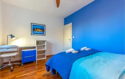 Krevet ili kreveti u jedinici u objektu Three-Bedroom Holiday Home In Jesenice