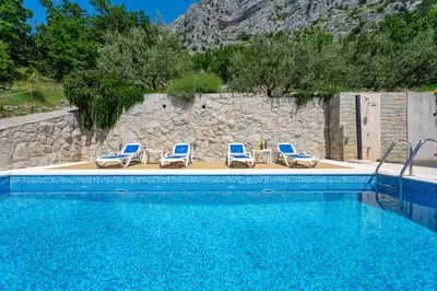 Bazen u objektu Villa Maruncela with sea and island views, 5 bedrooms, private pool, gym ili u blizini