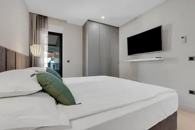 TV i/ili zabavni centar u objektu Apartmani Vila Jelena - Makarska Exklusiv