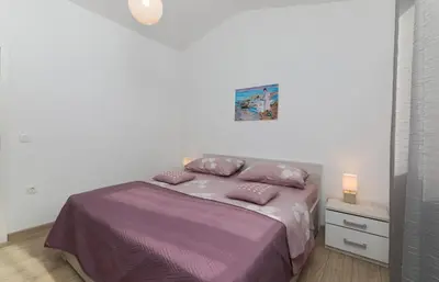 Krevet ili kreveti u jedinici u objektu Holiday Home Prapatna 17608