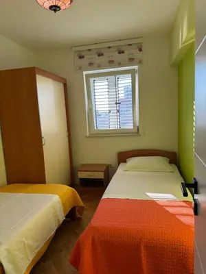 Krevet ili kreveti u jedinici u objektu Family Apartment Green with a sea view and a free parking