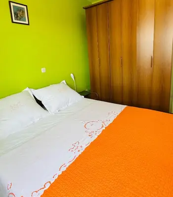 Krevet ili kreveti u jedinici u objektu Family Apartment Green with a sea view and a free parking