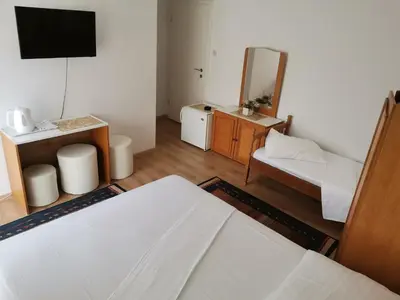 Krevet ili kreveti u jedinici u objektu Sobe Centar Baška Voda