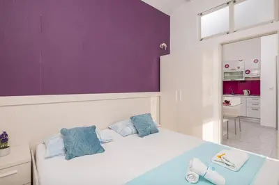 Krevet ili kreveti u jedinici u objektu Apartmani Kaštelančić