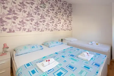 Krevet ili kreveti u jedinici u objektu Apartmani Kaštelančić