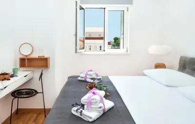 Krevet ili kreveti u jedinici u objektu Apartment Omis 17677b