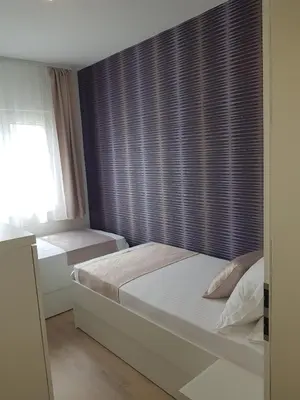 Krevet ili kreveti u jedinici u objektu Apartments Petričević