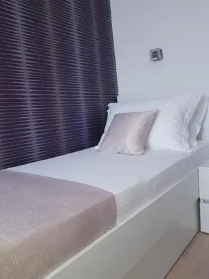 Krevet ili kreveti u jedinici u objektu Apartments Petričević