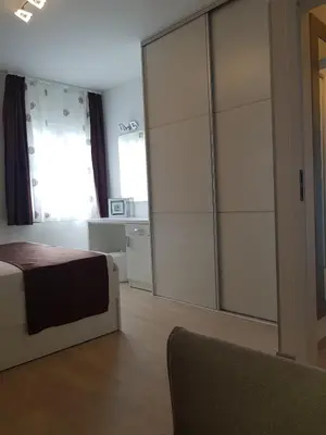 Krevet ili kreveti u jedinici u objektu Apartments Petričević