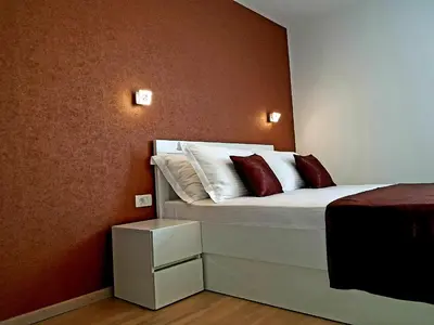 Krevet ili kreveti u jedinici u objektu Apartments Petričević