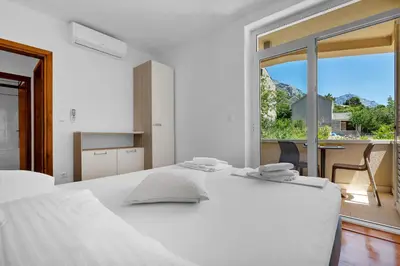 Krevet ili kreveti u jedinici u objektu Apartments Marin