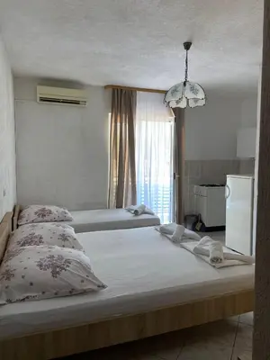 Krevet ili kreveti u jedinici u objektu Apartmani Palma Matija Baska Voda