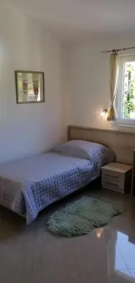 Krevet ili kreveti u jedinici u objektu Apartment Penthouse by the sea
