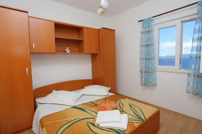 Krevet ili kreveti u jedinici u objektu Apartments with parking space Lokva Rogoznica, Omis - 17645