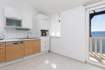 Kuhinja ili čajna kuhinja u objektu Apartments Villa Carica B&B