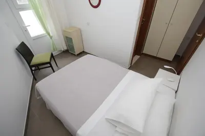 Krevet ili kreveti u jedinici u objektu Apartments Villa Čizmić