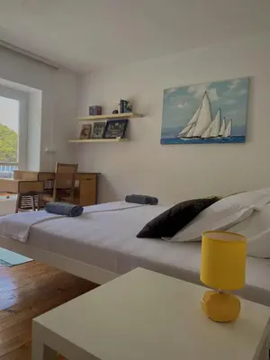 Krevet ili kreveti u jedinici u objektu Robinson Crusoe ECO bay apartment