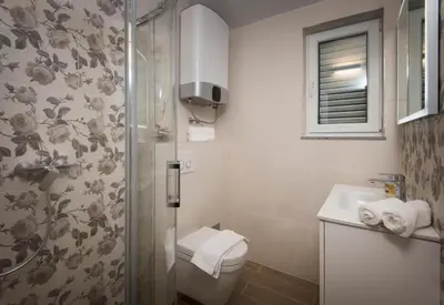 Kupaonica u objektu Villa J&J Apartments Residence with Swimming pool