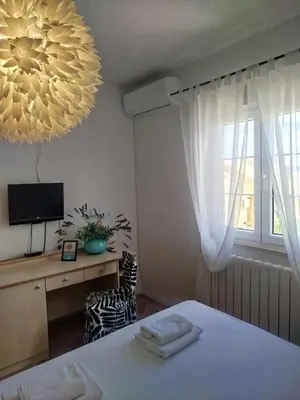 Krevet ili kreveti u jedinici u objektu ROOMS LUCE 2 & Supetar