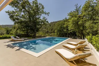 Bazen u objektu Villa VENTURA with private 45 sqm swimming pool, 4 bedrooms, gym, game room ili u blizini