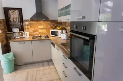 Kuhinja ili čajna kuhinja u objektu Obiteljska kuća za odmor Futura
