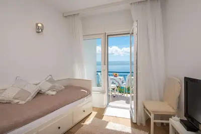 Krevet ili kreveti u jedinici u objektu Caleta Seaview Suites - Pool & Jacuzzi