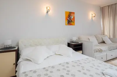 Krevet ili kreveti u jedinici u objektu Caleta Seaview Suites - Pool & Jacuzzi