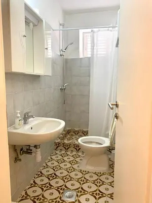 Kupaonica u objektu Apartments Nikola Stipišić