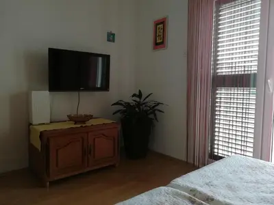TV i/ili zabavni centar u objektu Apartmani Šabić A2