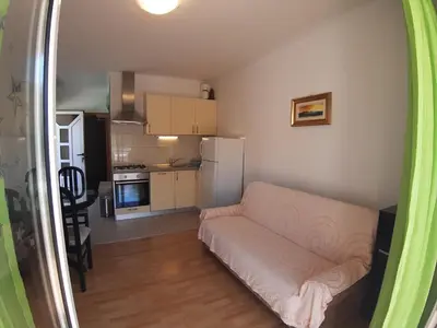 Kuhinja ili čajna kuhinja u objektu Apartments and Rooms Dobrila