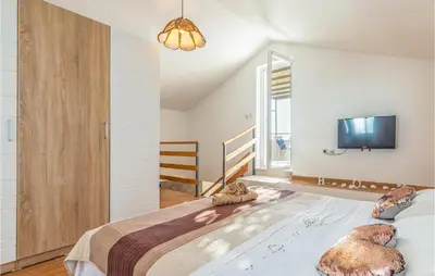 Krevet ili kreveti u jedinici u objektu Awesome Home In Makarska