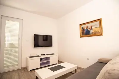 TV i/ili zabavni centar u objektu Apartments Andelko