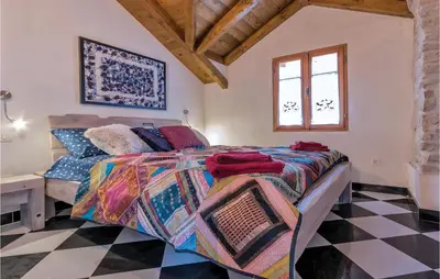 Krevet ili kreveti u jedinici u objektu Stunning Home In Milna With Sauna