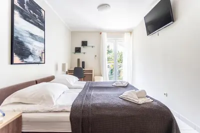 Krevet ili kreveti u jedinici u objektu Apartments Lavica Beach Dumičić
