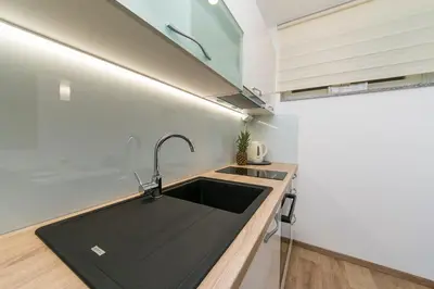 Kuhinja ili čajna kuhinja u objektu Apartments Villa Nadalina Deluxe