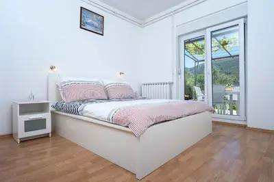 Krevet ili kreveti u jedinici u objektu Apartments Draganic