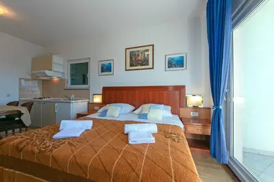 Krevet ili kreveti u jedinici u objektu Apartments Marko