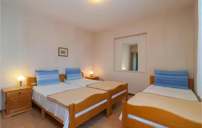 Krevet ili kreveti u jedinici u objektu Nice Apartment In Splitska With Wifi