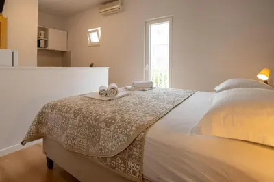 Krevet ili kreveti u jedinici u objektu Apartments Gianni
