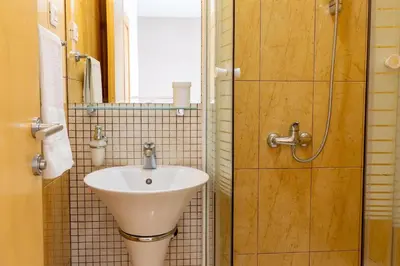 Kupaonica u objektu Apartments Gianni
