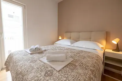 Krevet ili kreveti u jedinici u objektu Apartments Gianni