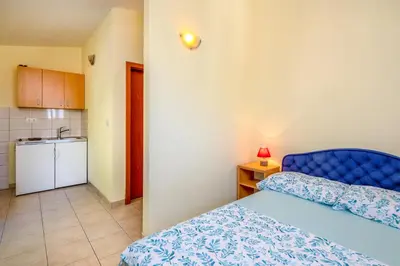 Krevet ili kreveti u jedinici u objektu Apartments & Restaurant Galeb