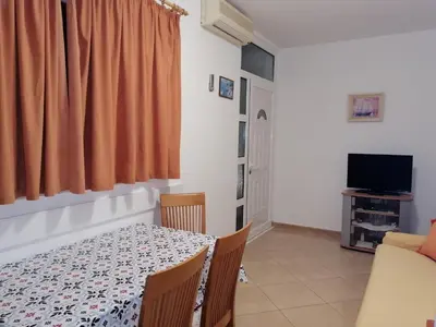 TV i/ili zabavni centar u objektu Apartmani Stipan