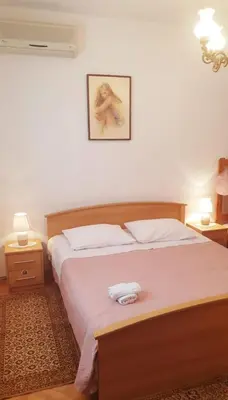 Krevet ili kreveti u jedinici u objektu Apartments Sunset